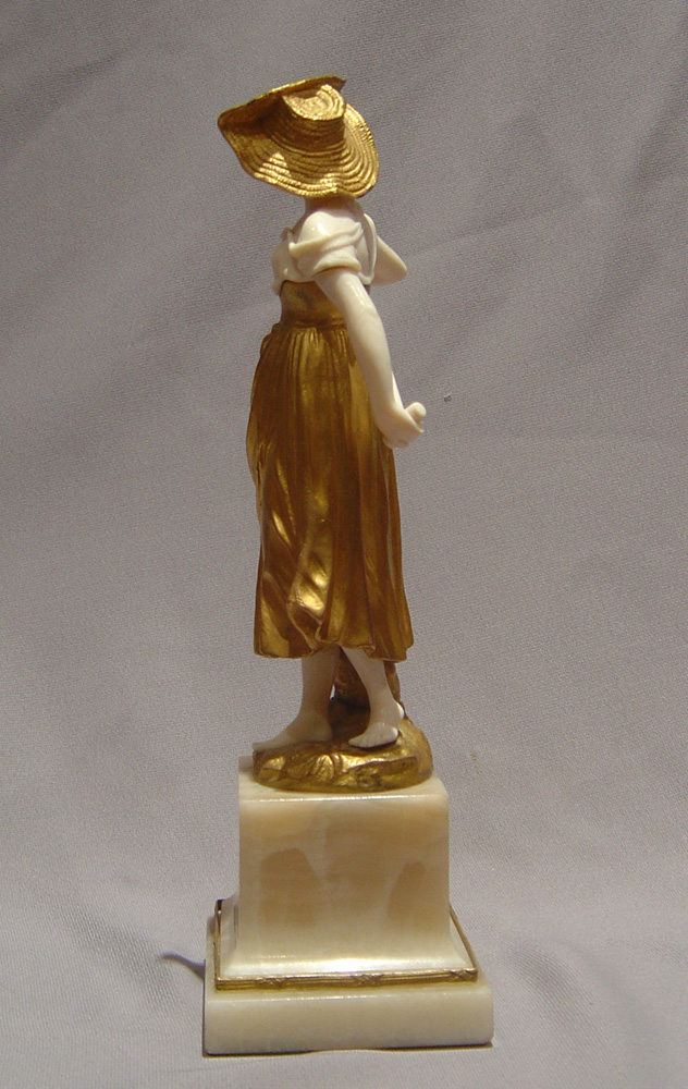 Art Deco bronze and ivory figure of a gardener.