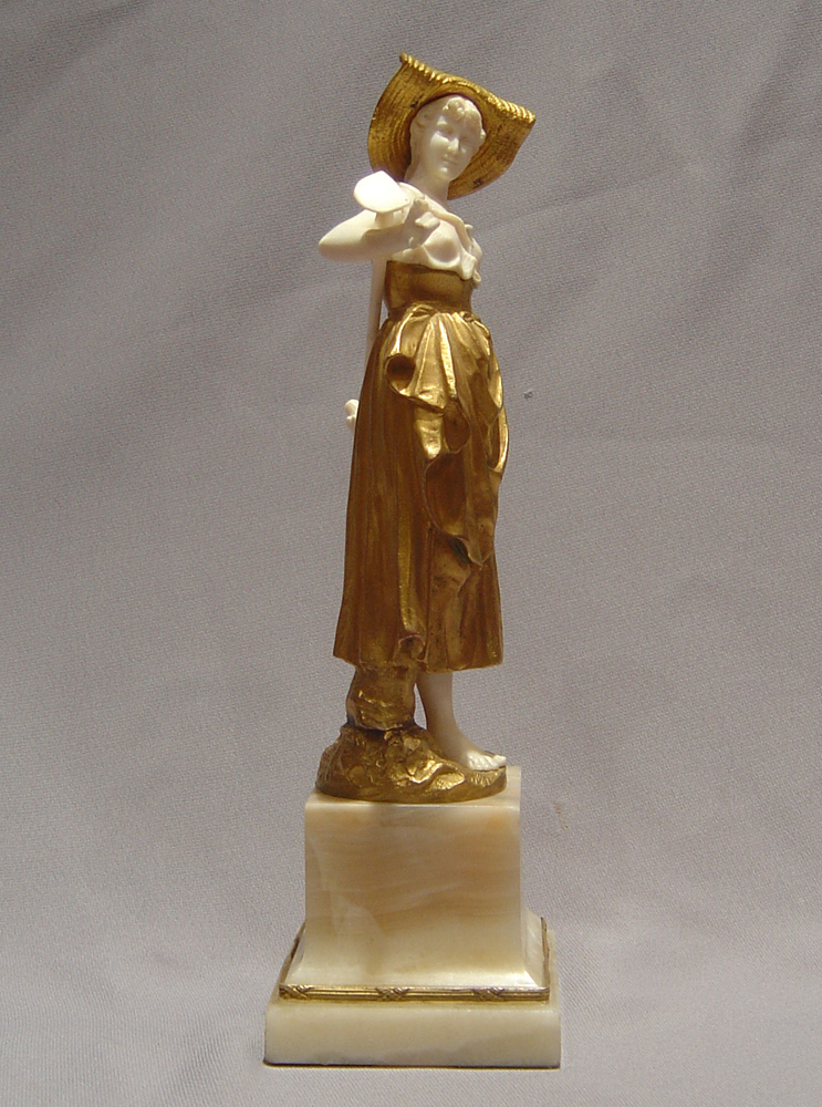 Art Deco bronze and ivory figure of a gardener.