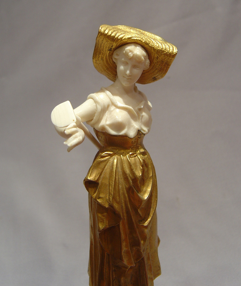 Art Deco bronze and ivory figure of a gardener.