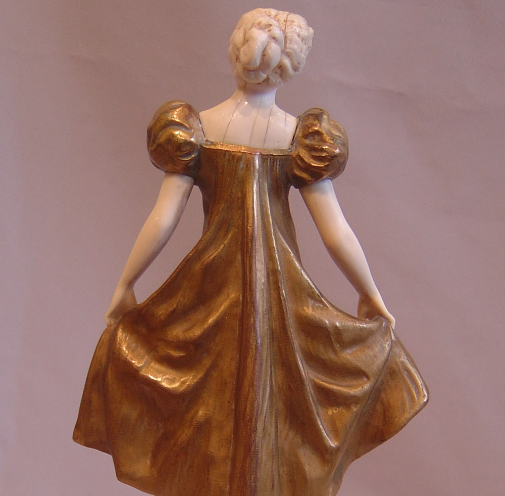 Art Deco bronze and ivory of a young girl signed A.M.Wolff fec.