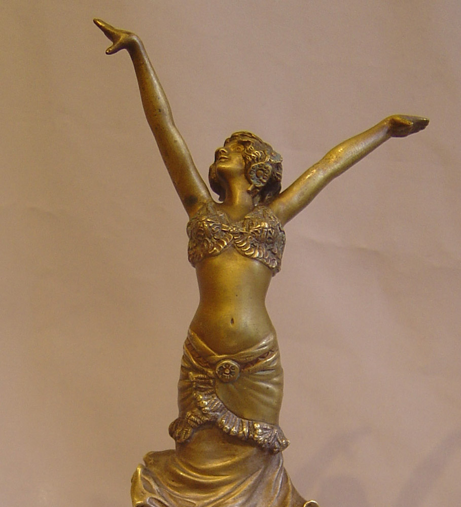 Art Deco Paul Philippe bronze figure on rouge marble base.