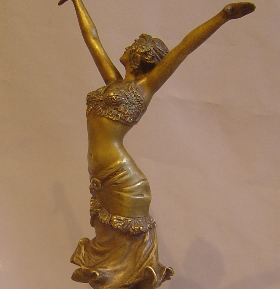 Art Deco Paul Philippe bronze figure on rouge marble base.