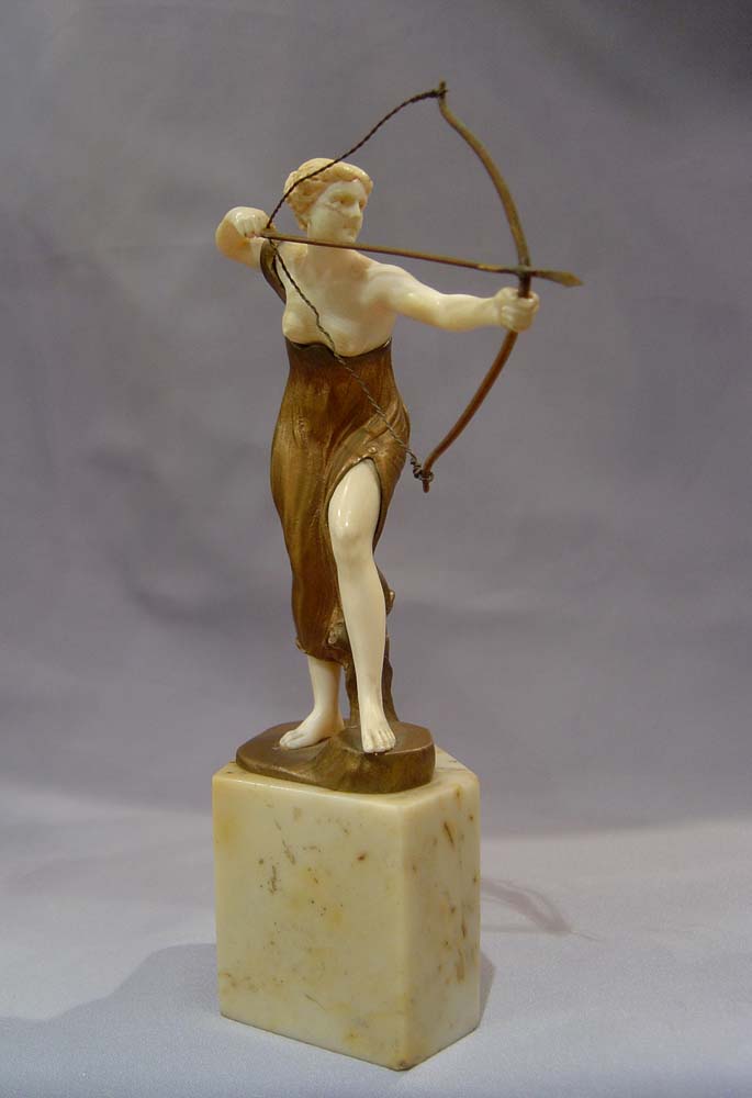 Art Deco bronze and ivory figure on marble base by Morin.