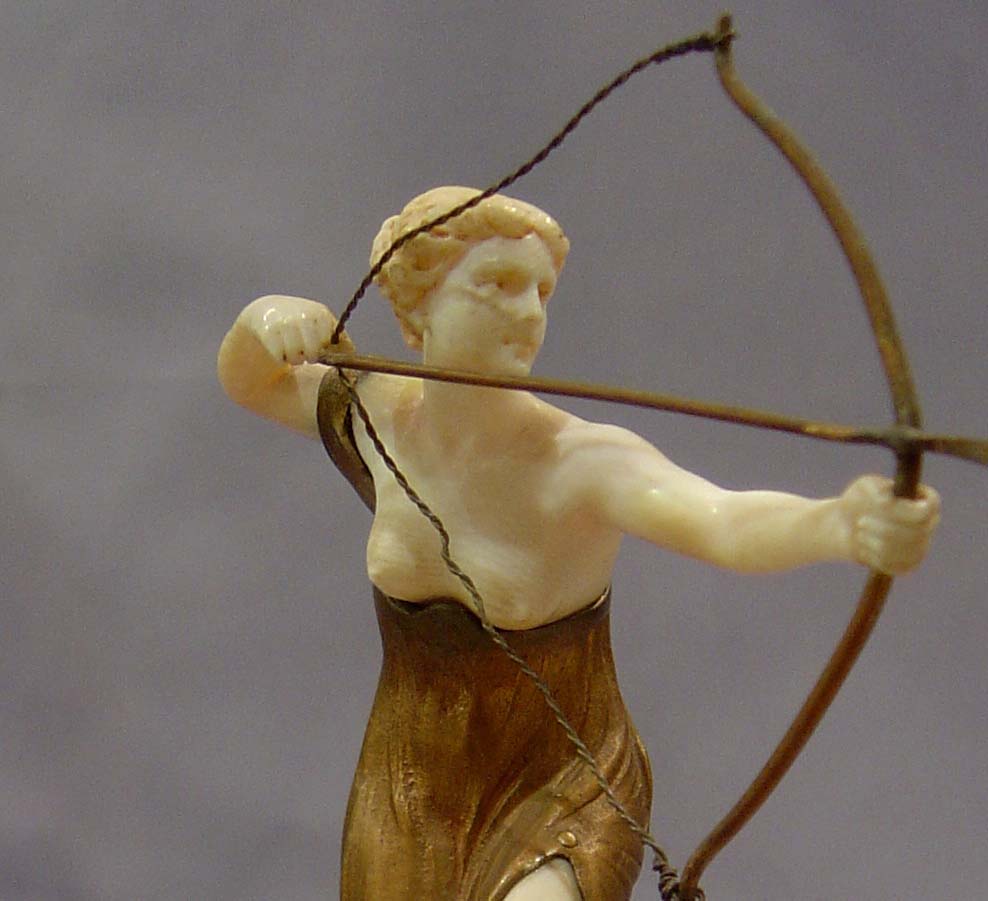 Art Deco bronze and ivory figure on marble base by Morin.