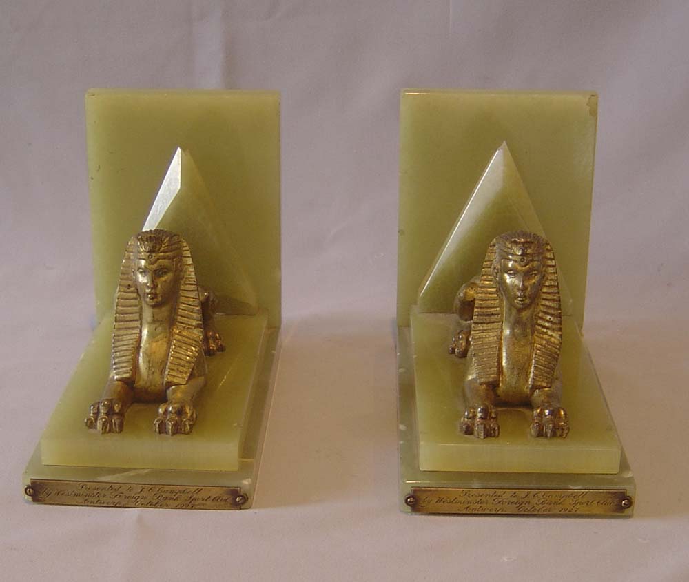 Pair of Art Deco Egyptian revival green onyx and gilt bronze Sphynx bookends.