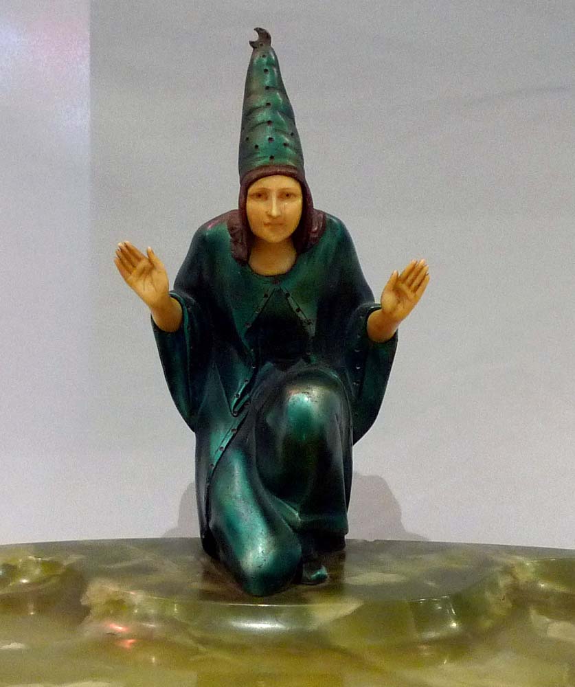 Superb Art Deco figure in bronze and ivory on dish base signed Peleska. .