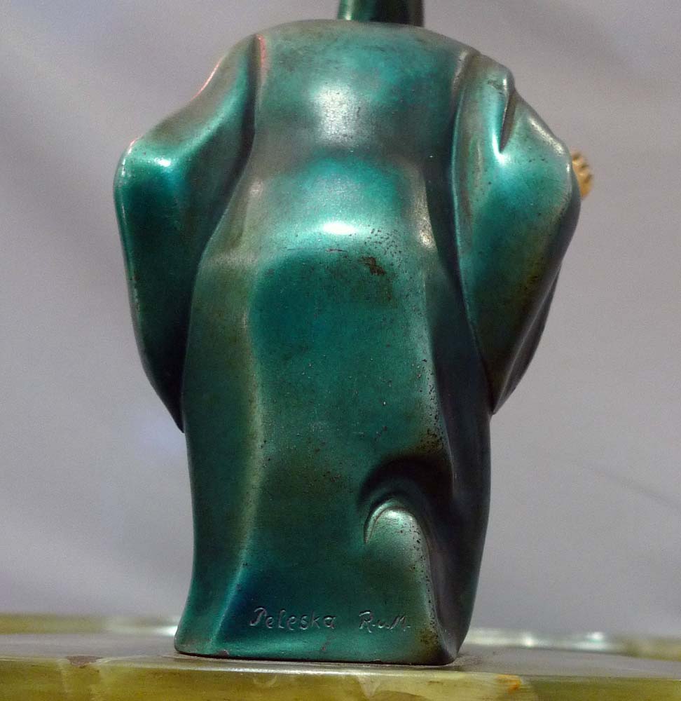 Superb Art Deco figure in bronze and ivory on dish base signed Peleska. .