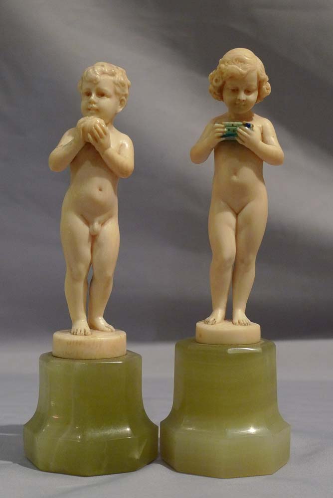 Preiss, Fritz Ferdinand a pair of Art Deco ivory statuettes of young boy and girl.