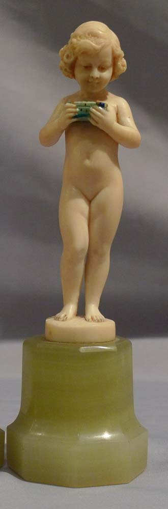 Preiss, Fritz Ferdinand a pair of Art Deco ivory statuettes of young boy and girl.