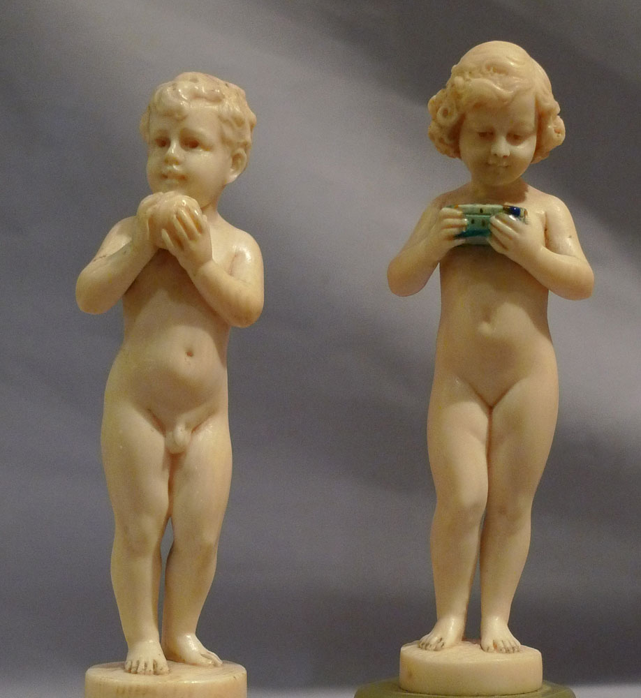 Preiss, Fritz Ferdinand a pair of Art Deco ivory statuettes of young boy and girl.