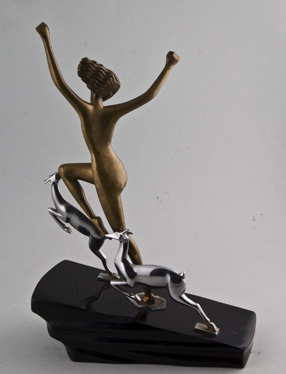 Art deco bronze group of a Dancer with fawns.