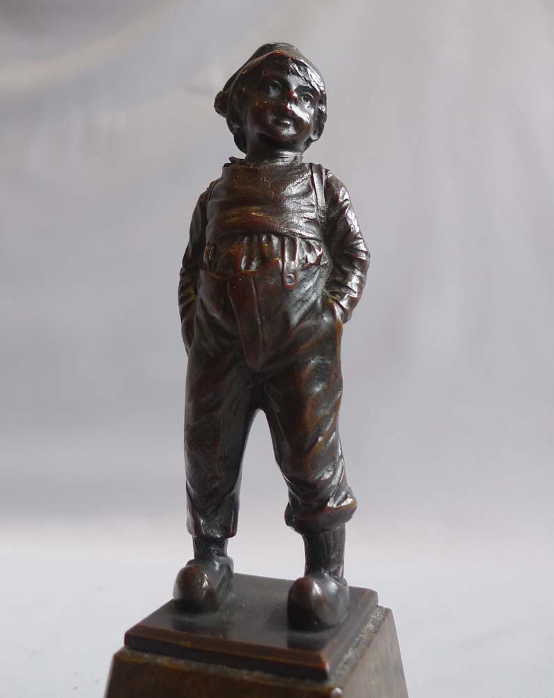 Art Deco pair of bronze girl and boy on marble bases.