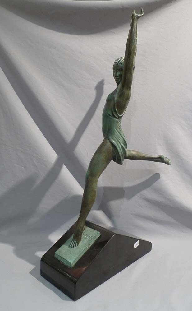 Art Deco green patinated bronze  of a dancer on a marble base.