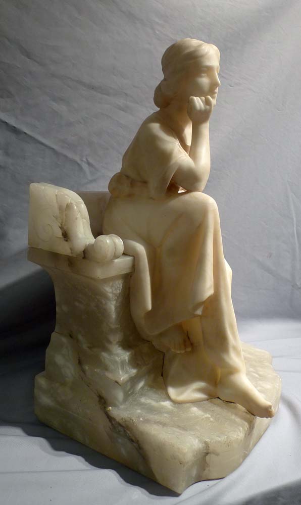 Antique Italian alabaster study of a seated girl.