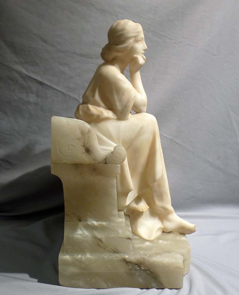 Antique Italian alabaster study of a seated girl.