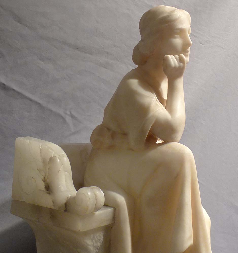 Antique Italian alabaster study of a seated girl.