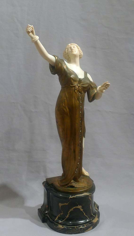 Bronze and ivory Art Deco figure of a dancer on antique vert marble base.