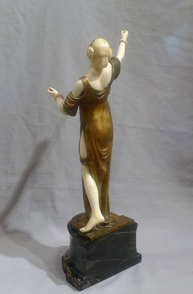 Bronze and ivory Art Deco figure of a dancer on antique vert marble base.