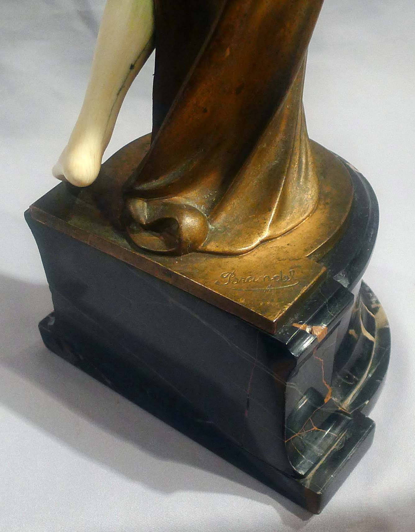 Bronze and ivory Art Deco figure of a dancer on antique vert marble base.