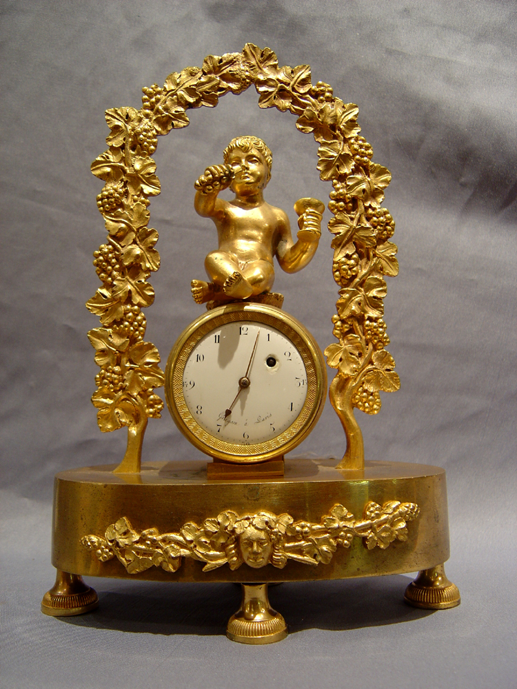 Antique French Empire clock celebrating viticulture