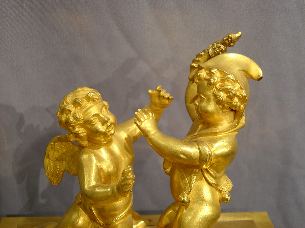 Antique French Directoire ormolu and patinated bronze clock with Egyptian theme.