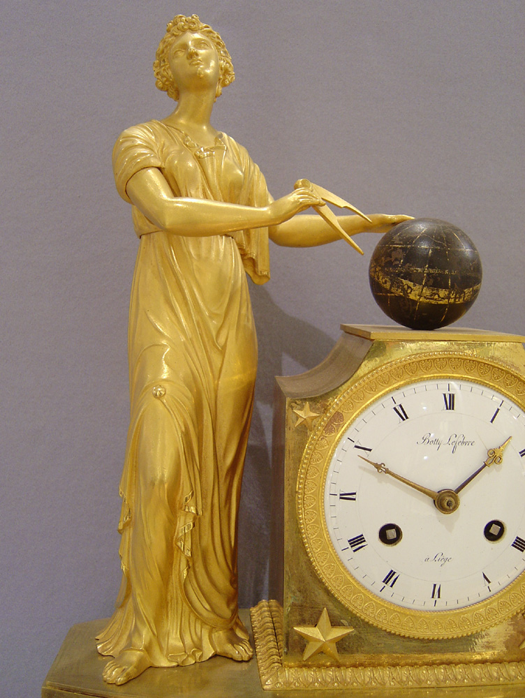 Antique French Empire ormolu mantel clock representing Astronomy.