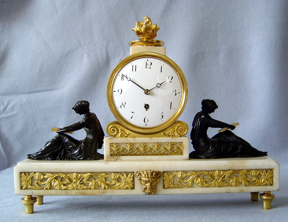 Antique English Regency neo-classical library clock by Grimalde and Johnson.