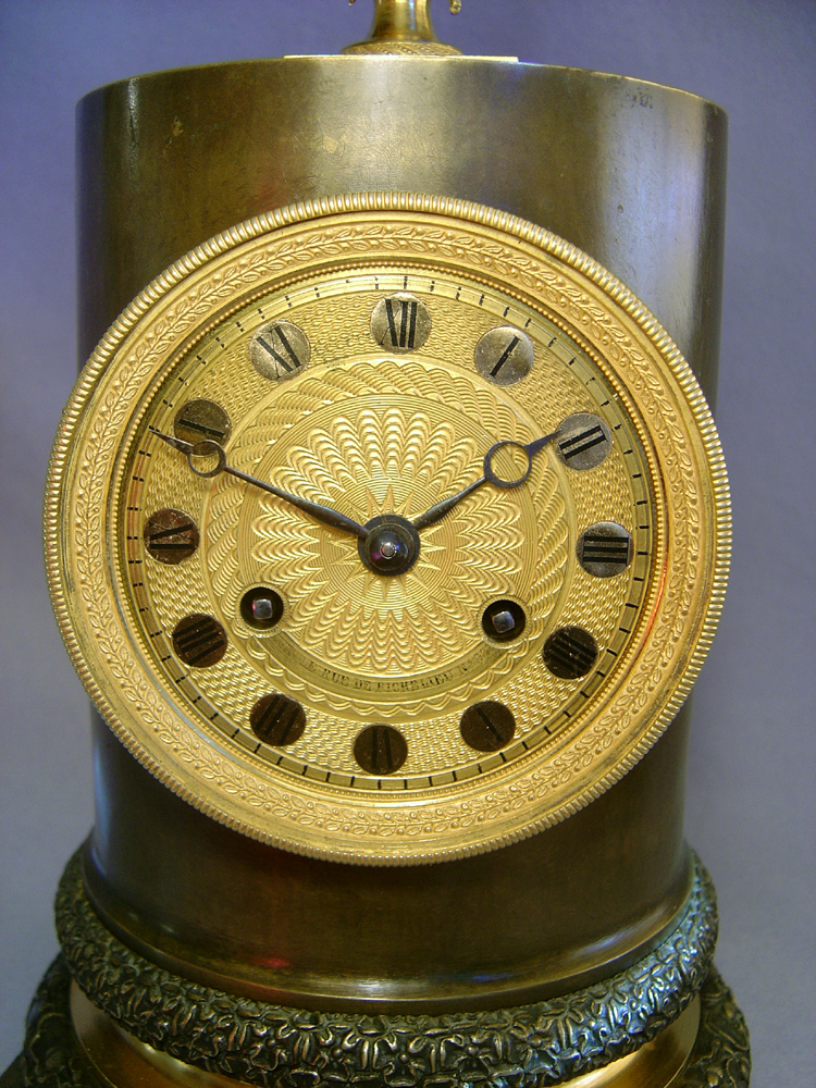 Antique French Empire clock in patinated bronze and ormolu by Claude Galle.