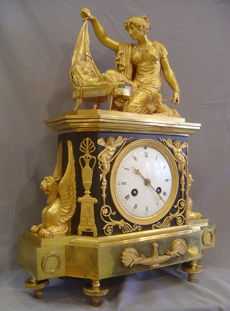 French Empire clock of Venus uncovering Cupid.