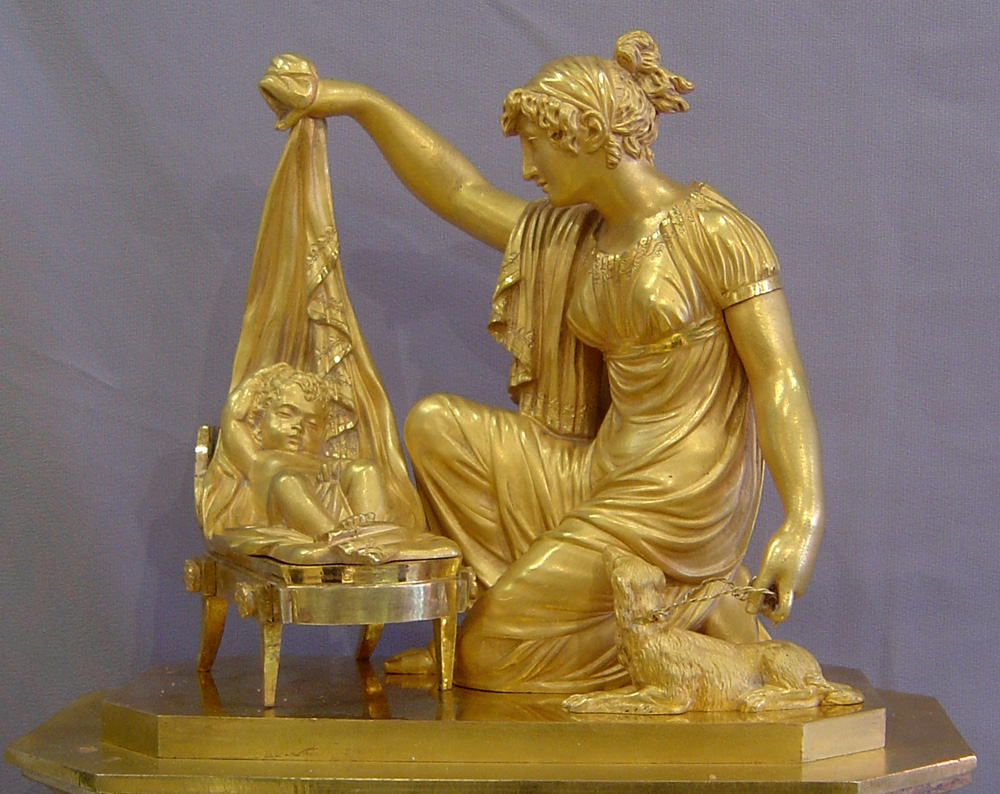 French Empire clock of Venus uncovering Cupid.