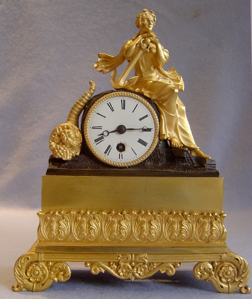 Antique Clock, French Charles X period in ormolu and patinated bronze of Hope, signed Leroy a Paris.