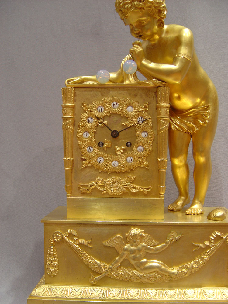 French antique clock of the Bubble blower after Thomire