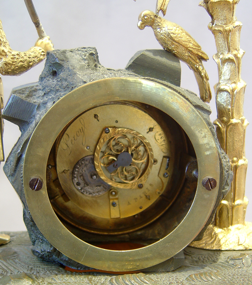 Antique French Robinson Crusoe mantel clock with musical base.