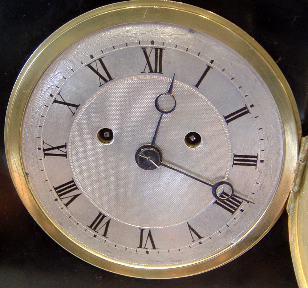 English late Regency Derbyshire black marble double fusee mantle clock in Egyptian style by Yonge.
