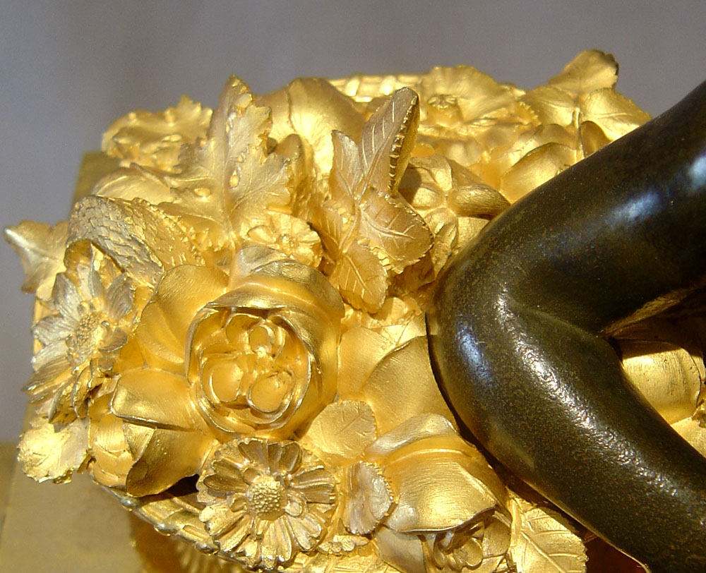 French Empire antique clock by Ledieur in marble, patinated bronze and ormolu.
