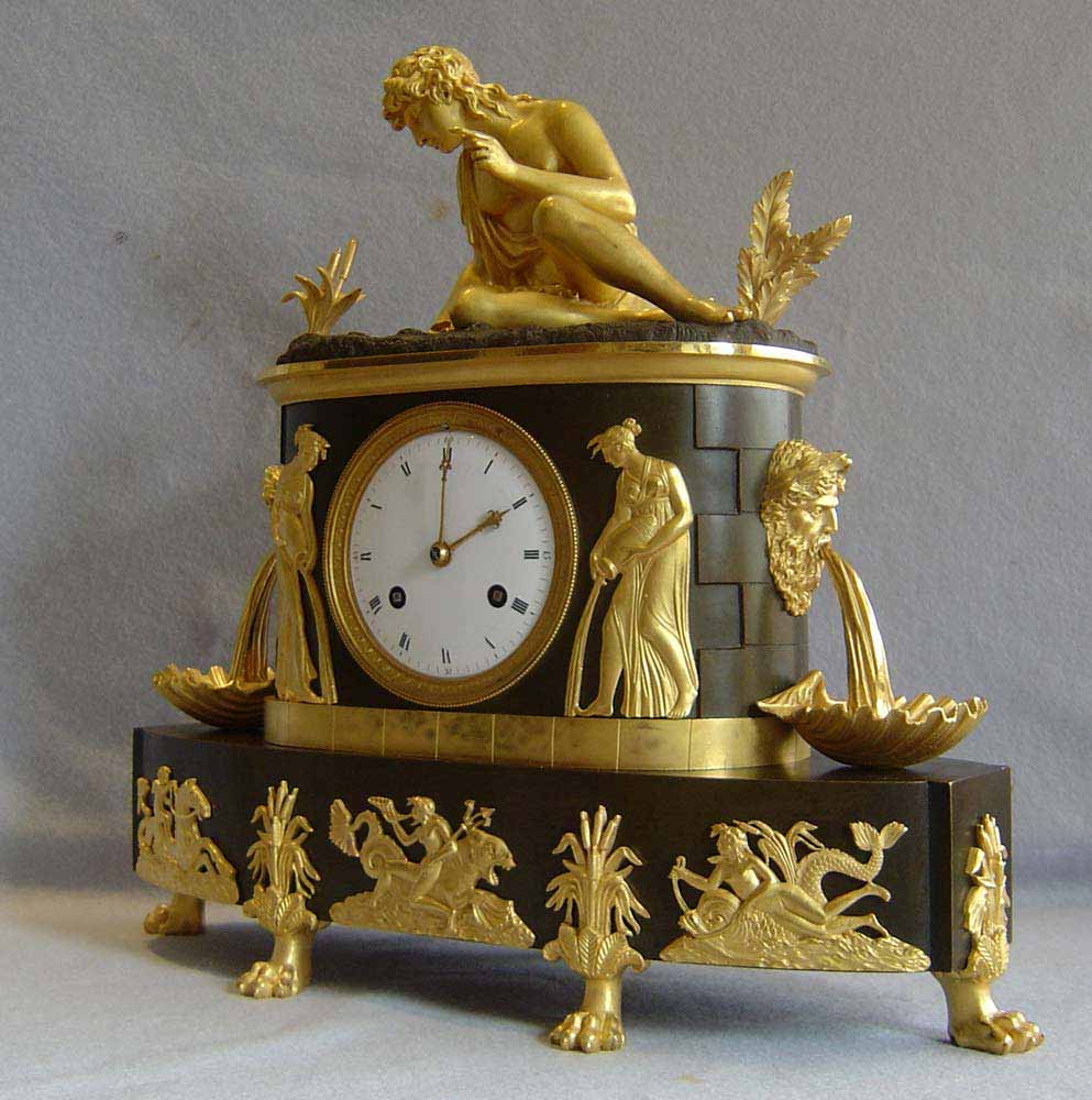French antique clock. Empire period of Narcissus dated 1808.