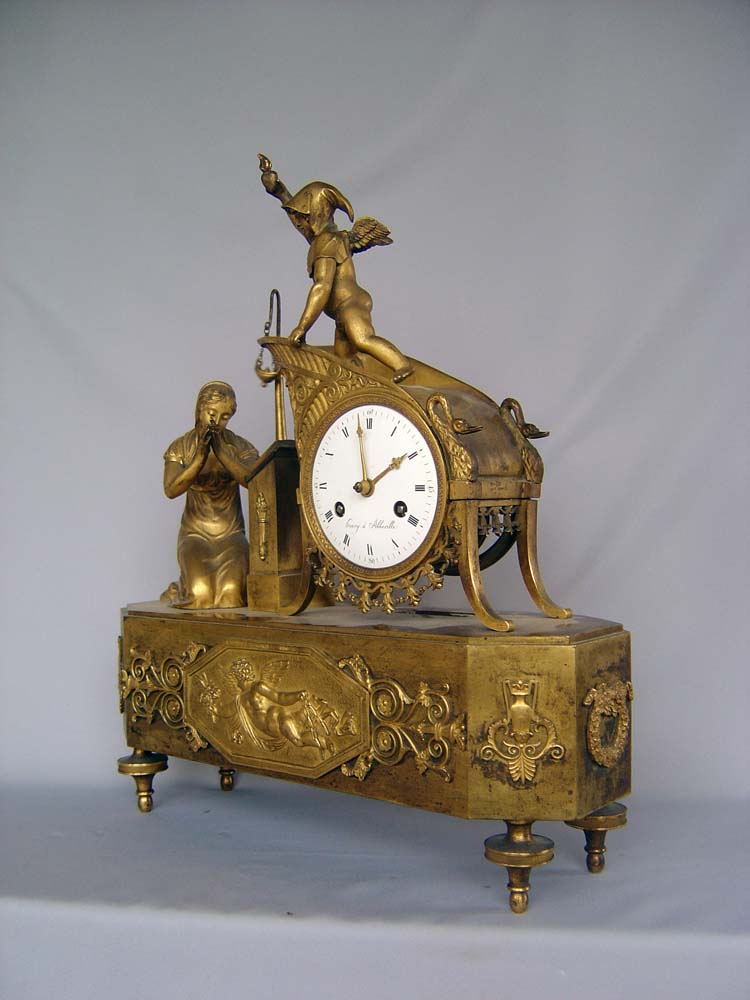 Antique French Empire ormolu clock of the 