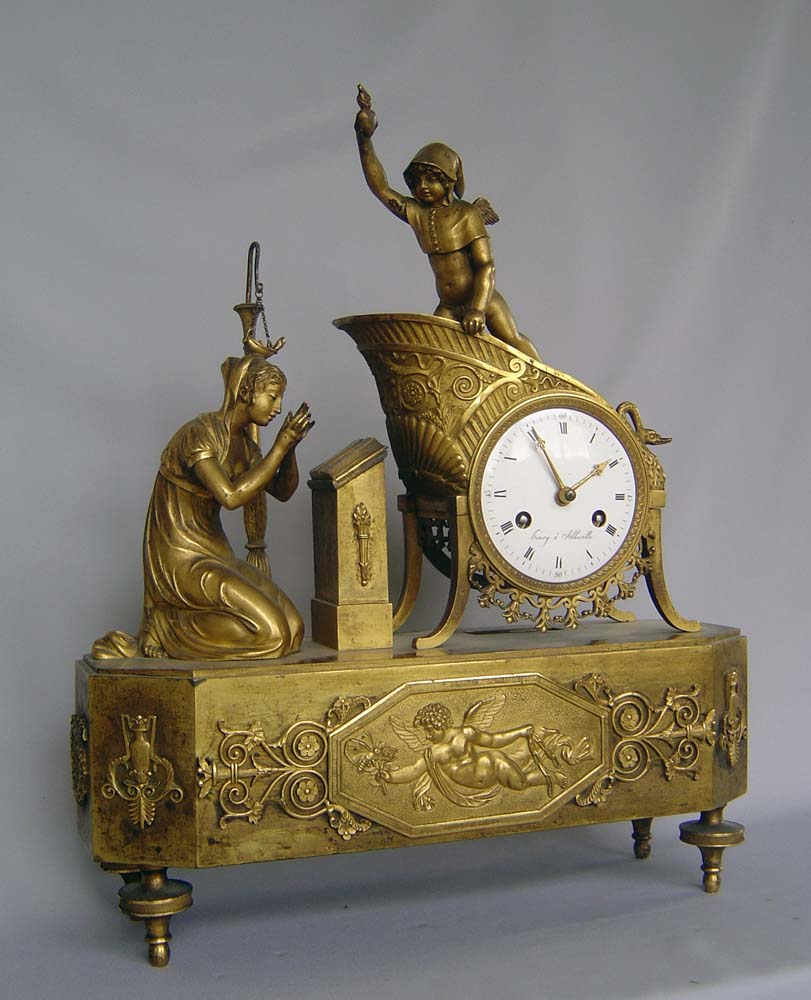 Antique French Empire ormolu clock of the 