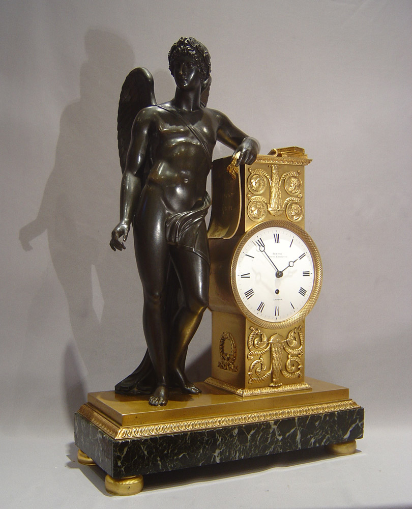  English Regency Neo Classical mantel clock of Genius of literature French, Royal Exchange, London.