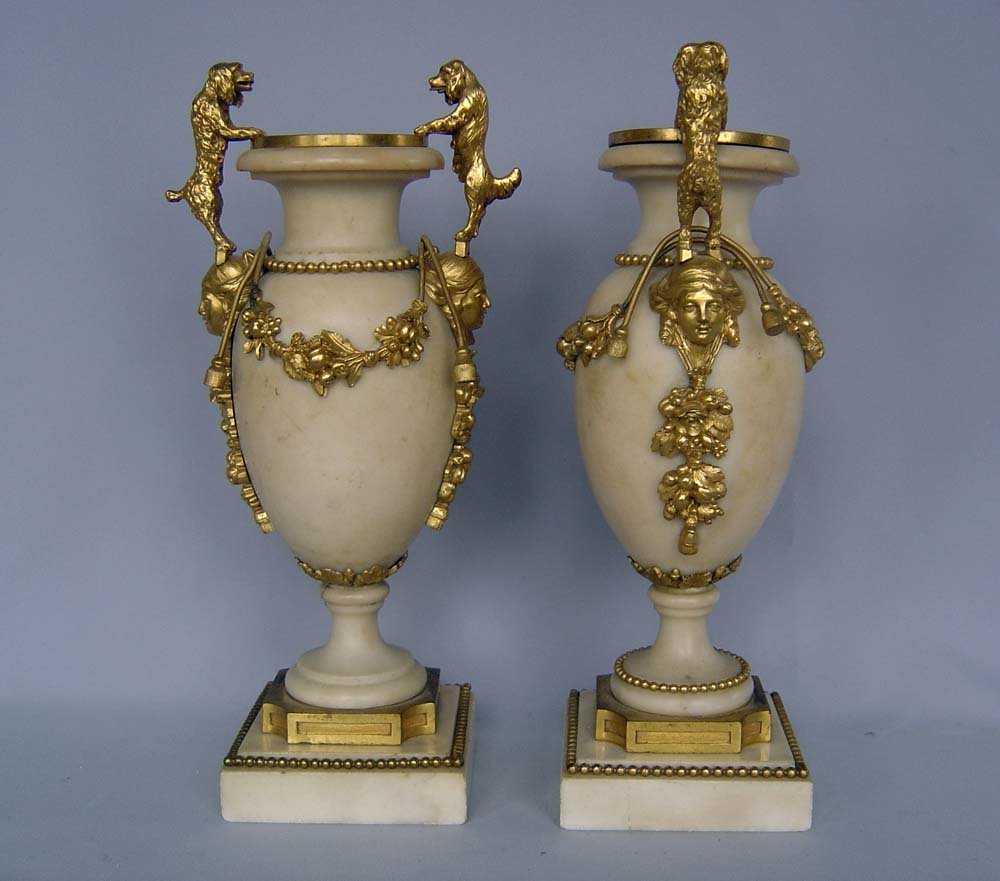 Antique Louis XVI French white marble and ormolu clock set signed Heron a Paris.