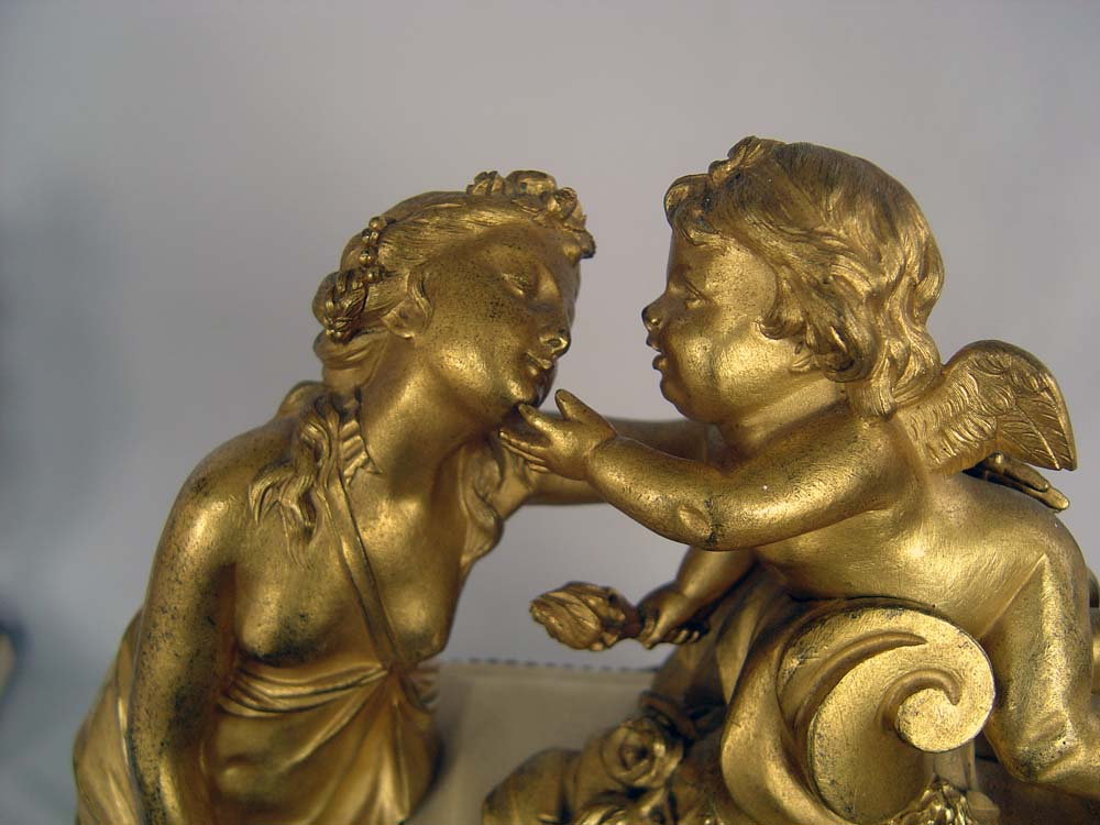 Antique Louis XVI French white marble and ormolu clock set signed Heron a Paris.