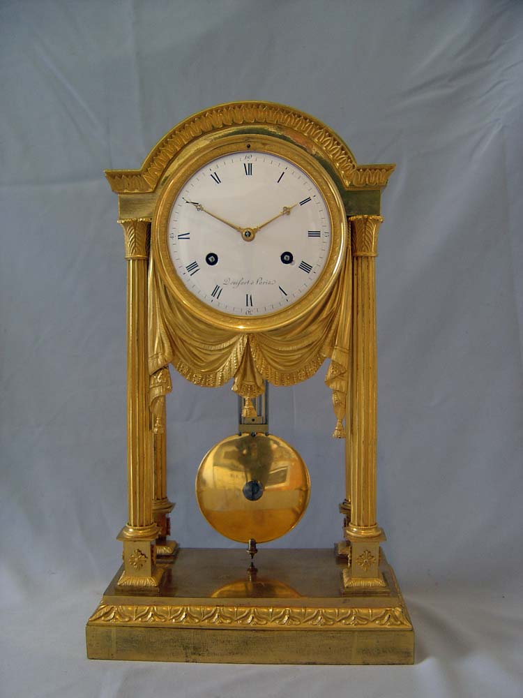 Antique French Empire ormolu mantel clock by Denisart a Paris.