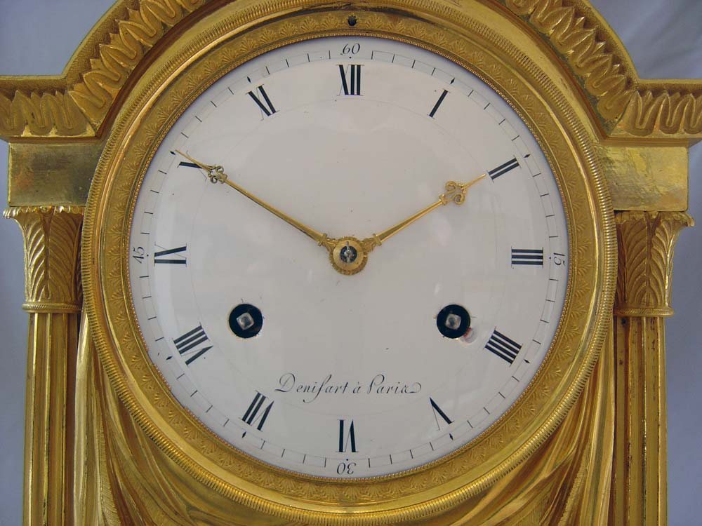 Antique French Empire ormolu mantel clock by Denisart a Paris.