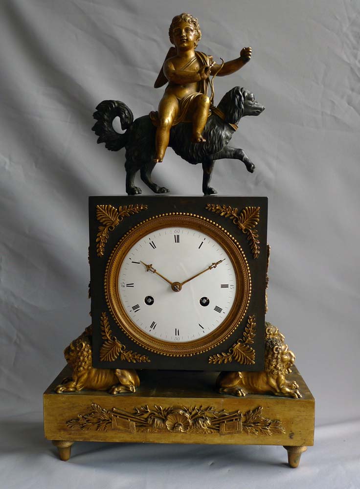 French Directoire or Empire clock with cupid riding a dog.