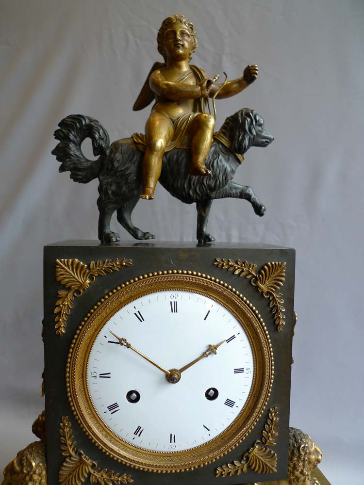 French Directoire or Empire clock with cupid riding a dog.