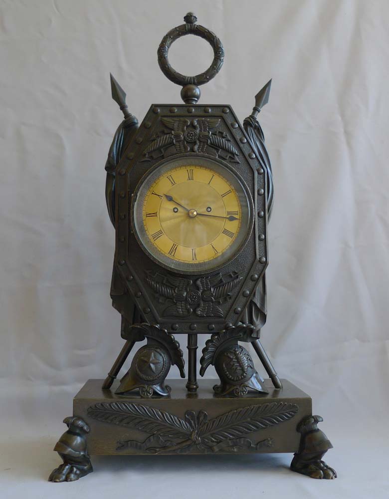 Antique clock in form of Trophies of War English Regency by Forrester of Hull.