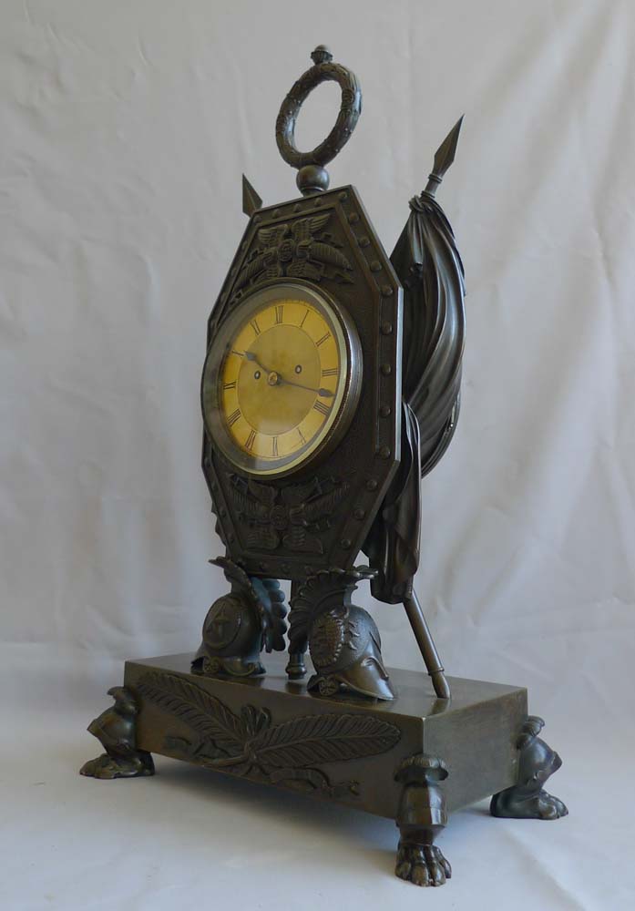 Antique clock in form of Trophies of War English Regency by Forrester of Hull.