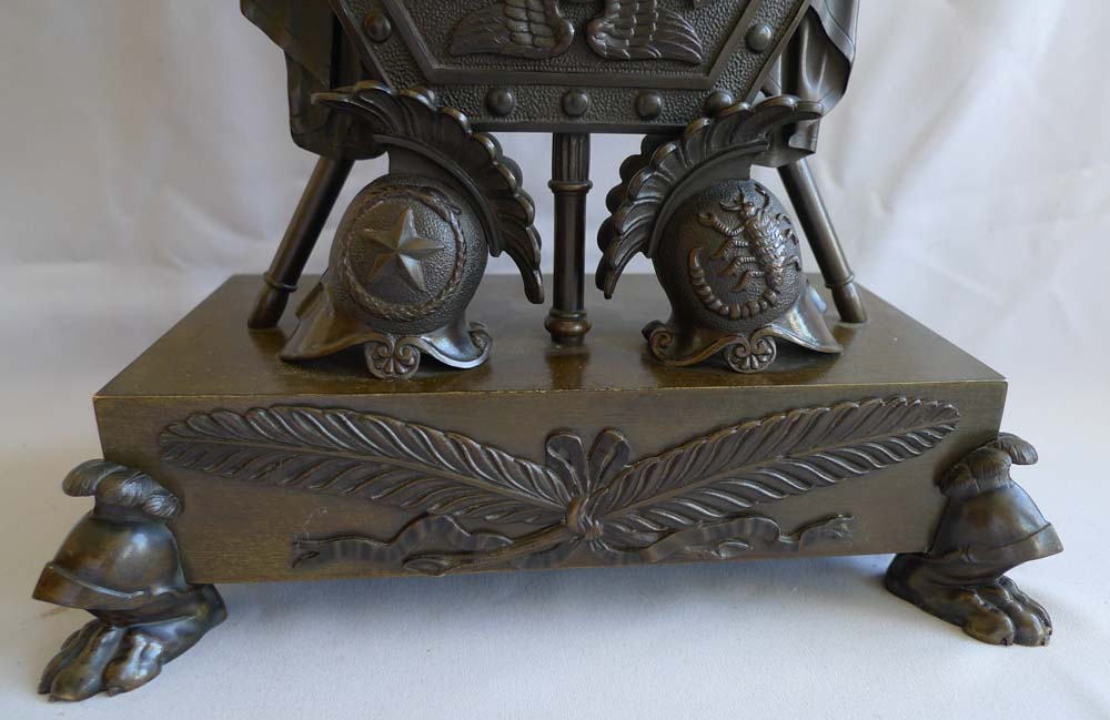Antique clock in form of Trophies of War English Regency by Forrester of Hull.