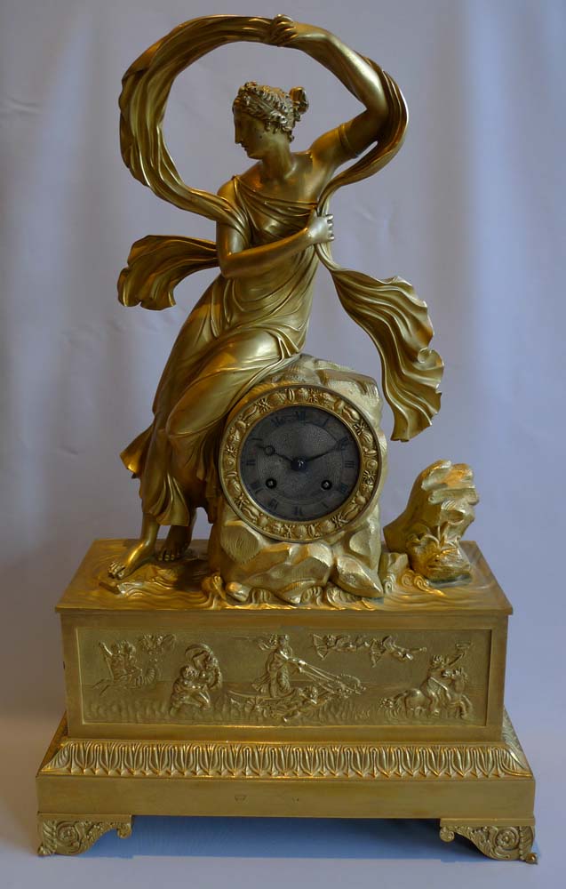 Antique French mantel clock in ormolu, Charles X period of Venus rising from the sea.
