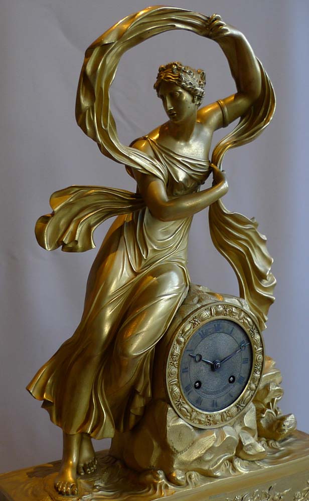Antique French mantel clock in ormolu, Charles X period of Venus rising from the sea.